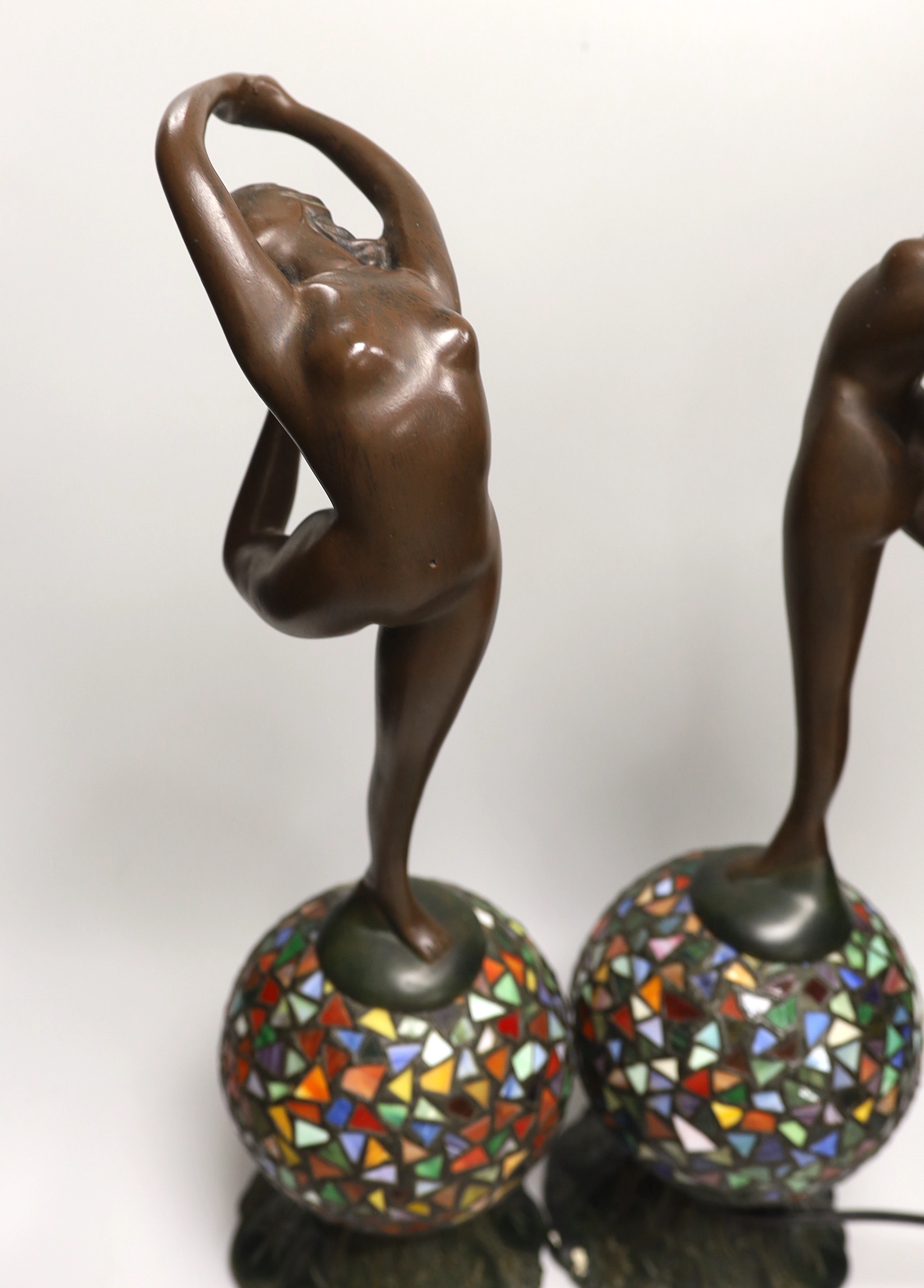 A pair of Tiffany-style bronzed resin figural table lamps 51cm